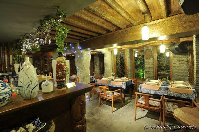 ליג'יאנג Blossom Hill Inn - Neverland מסעדה תמונה